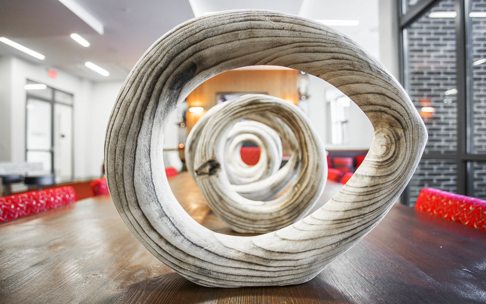Wooden hoops laid out on a table.